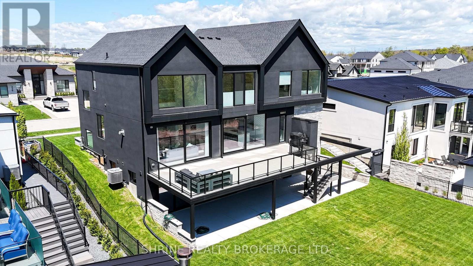 228 Edgewater Boulevard, Middlesex Centre, ON - Outdoor With Deck Patio Veranda