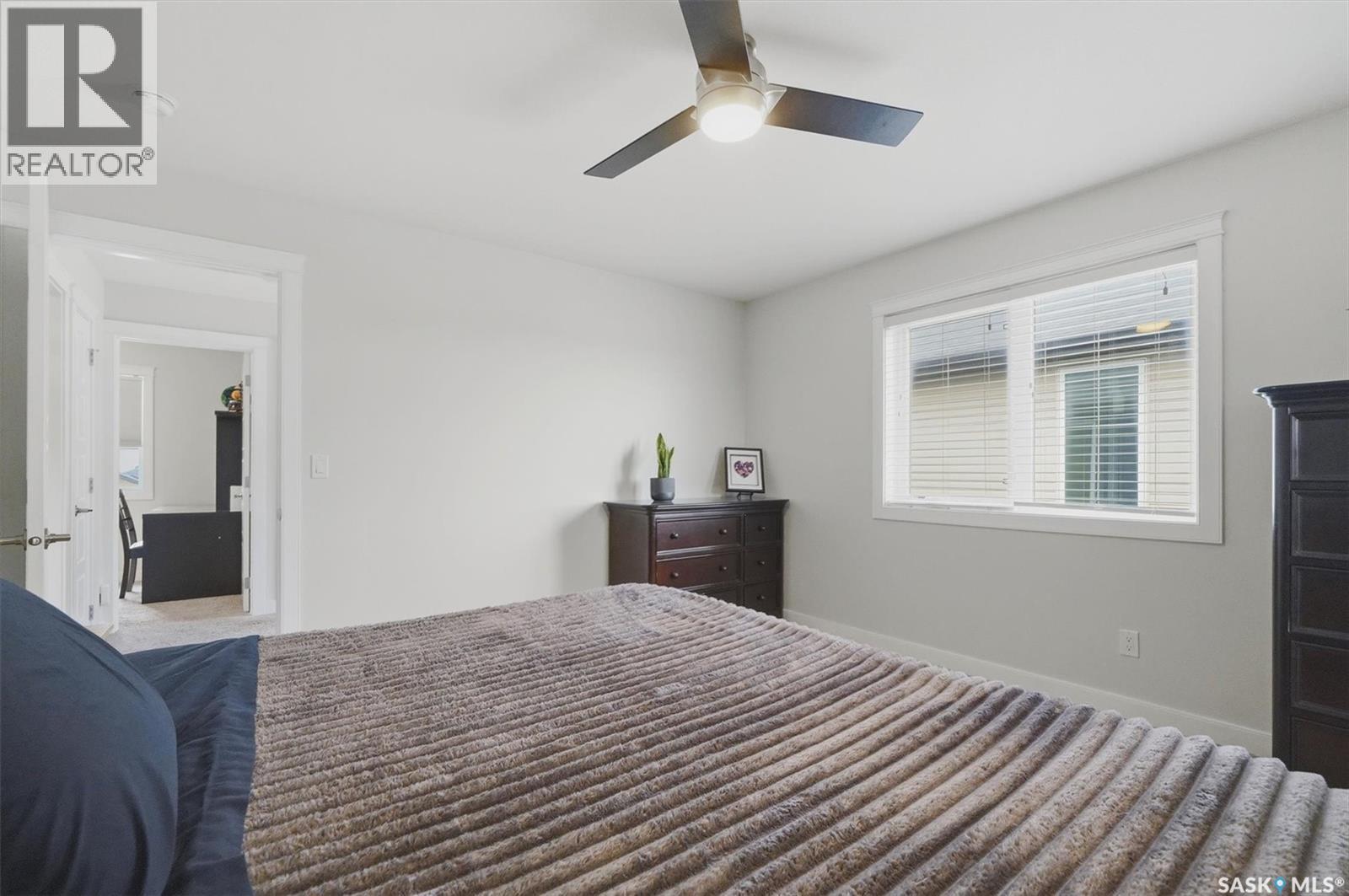 530 Maple Crescent, Warman, SK - Indoor Photo Showing Bedroom
