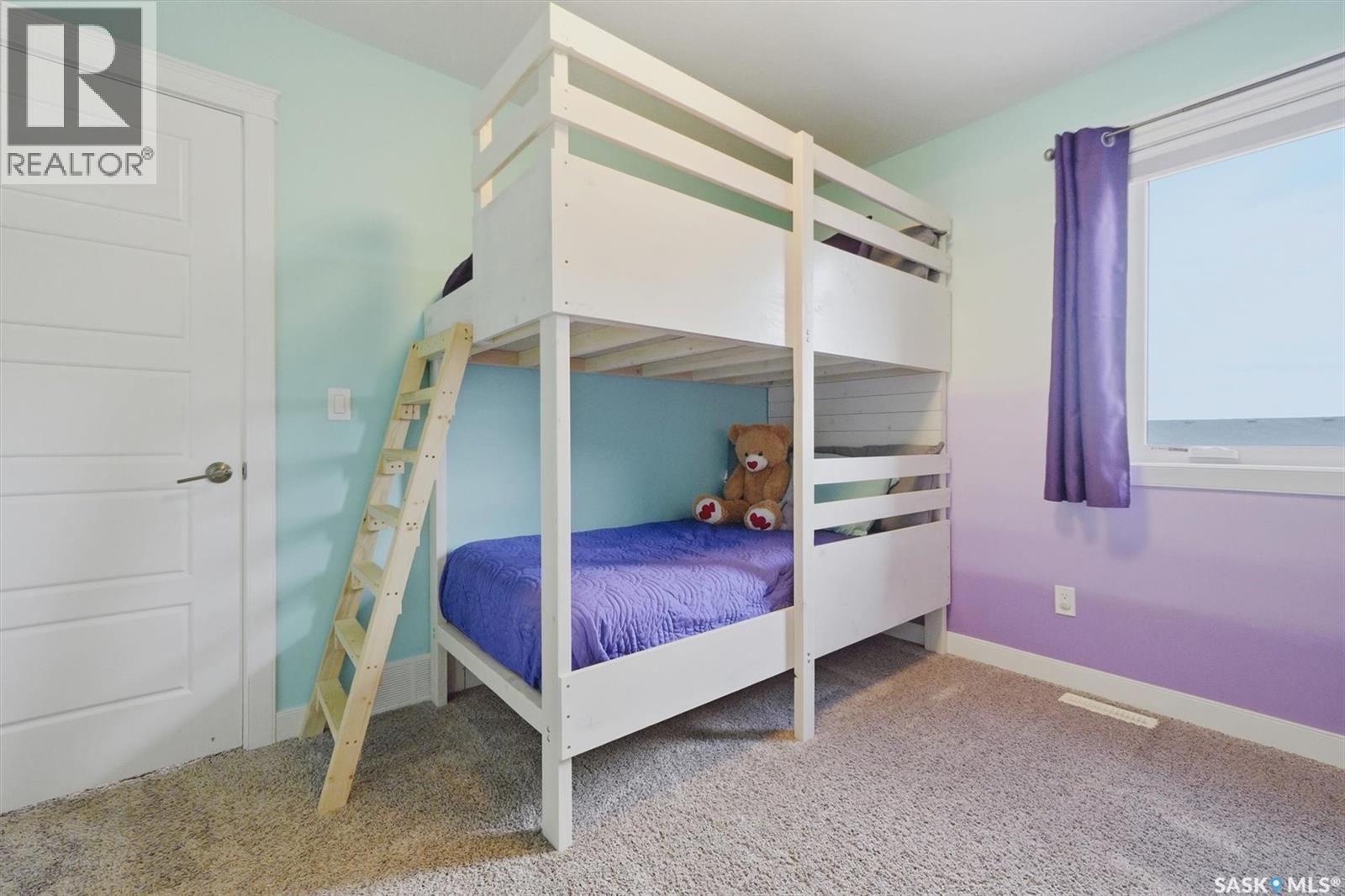 530 Maple Crescent, Warman, SK - Indoor Photo Showing Bedroom