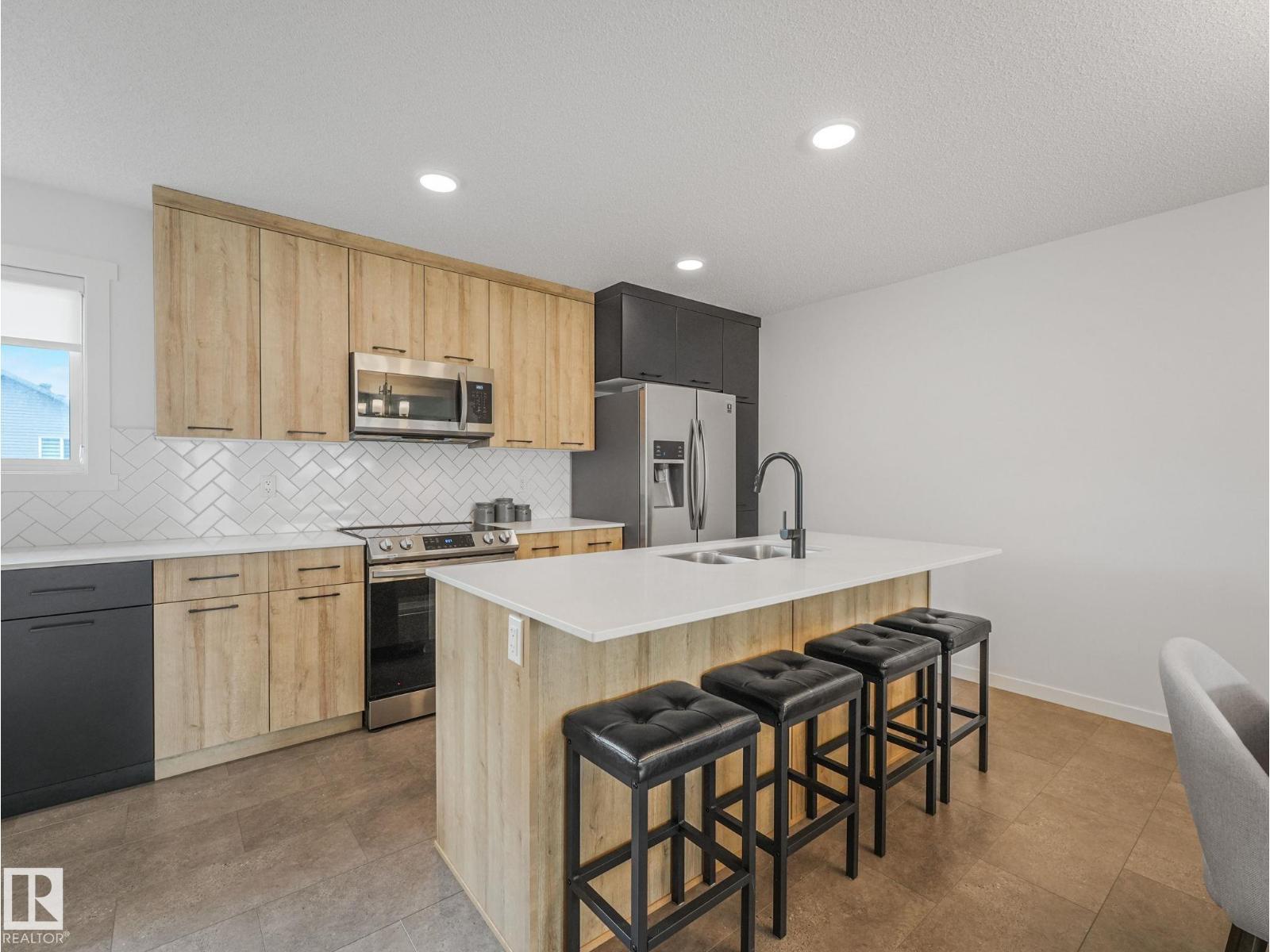 1061 Cy Becker Rd Nw, Edmonton, AB - Indoor Photo Showing Kitchen With Double Sink With Upgraded Kitchen