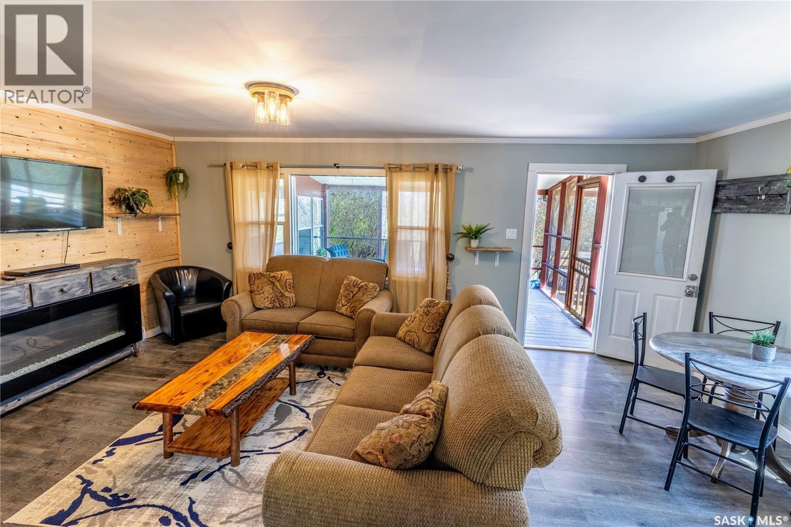 1041 Tatanka Drive, South Lake, SK - Indoor Photo Showing Living Room With Fireplace