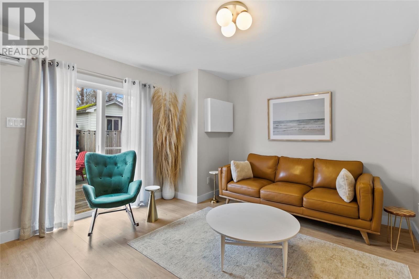 Living Room with Patio Doors to Rear Yard - 13 Devine Place, St. John'S, NL - Indoor Photo Showing Living Room