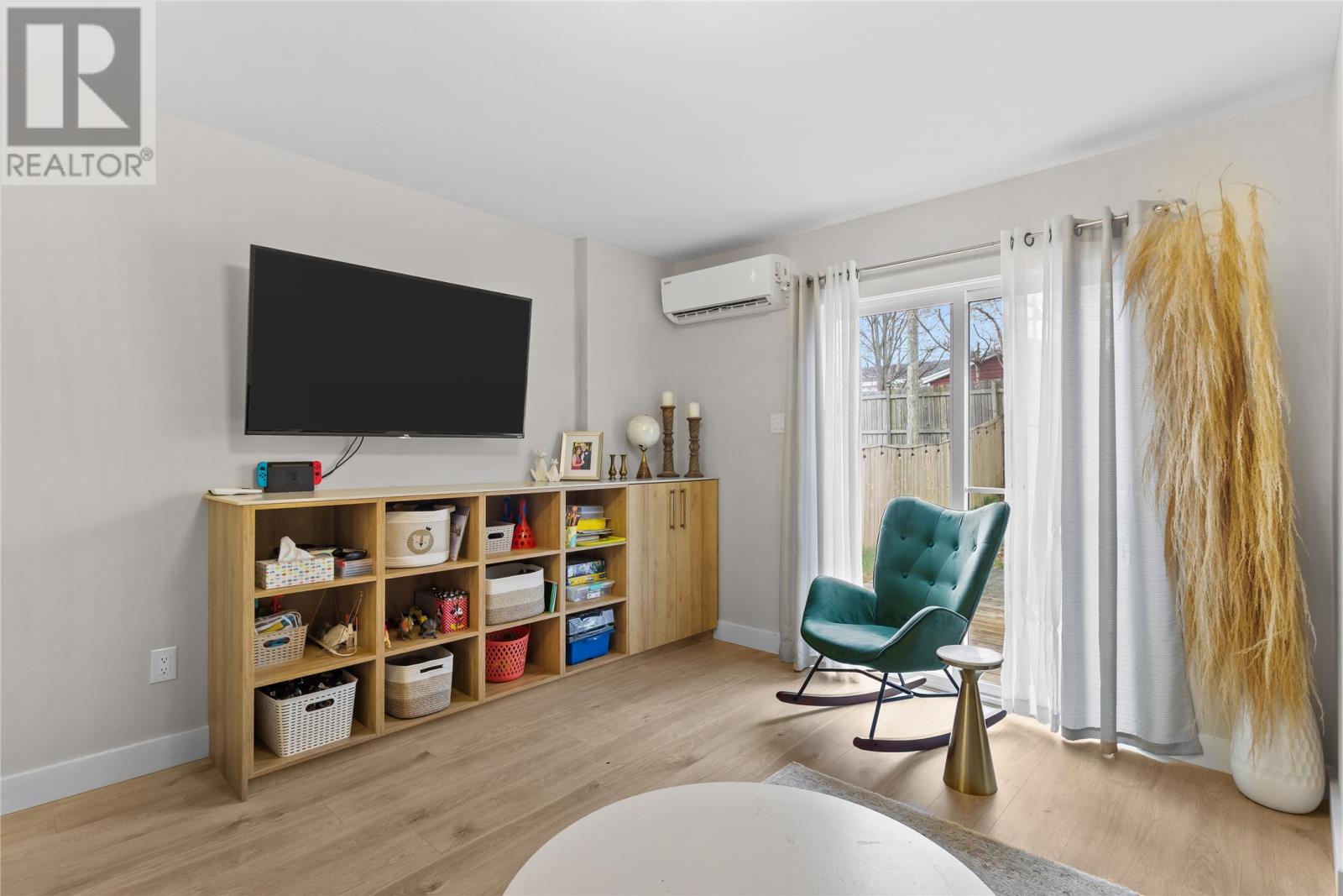Heat Pump in Living Room with built in shelving - 13 Devine Place, St. John'S, NL - Indoor