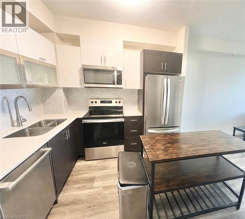 128 King Street N Unit# 607, Waterloo, ON - Indoor Photo Showing Kitchen With Double Sink With Upgraded Kitchen
