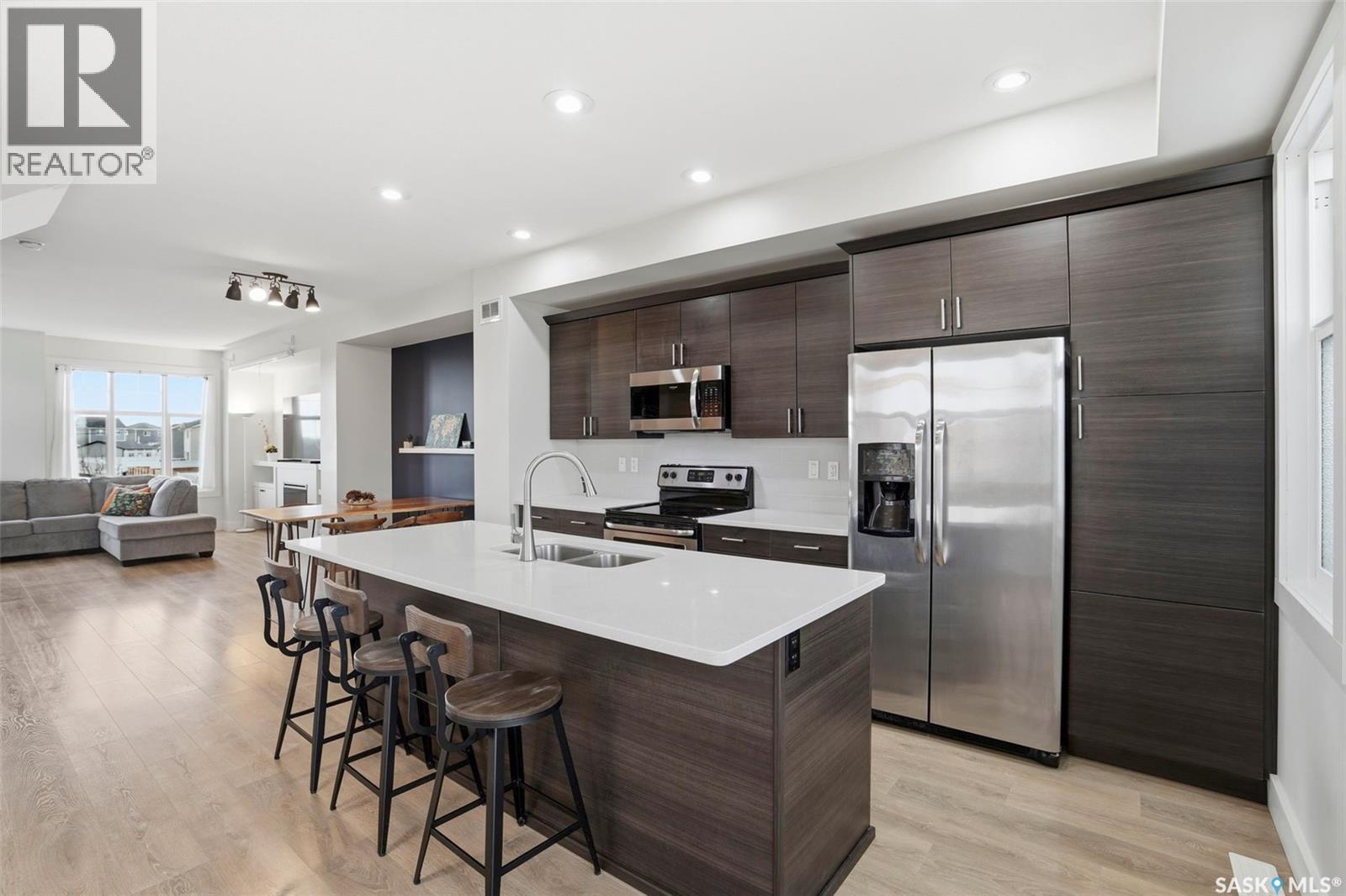 737 Meadows Boulevard, Saskatoon, SK - Indoor Photo Showing Kitchen With Stainless Steel Kitchen With Double Sink With Upgraded Kitchen
