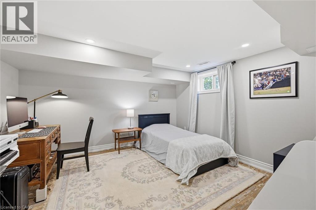 Bright room featuring recessed lighting, a window with natural light, and light-toned walls - 24 Glenwood Crescent, Hamilton, ON - Indoor Photo Showing Bedroom