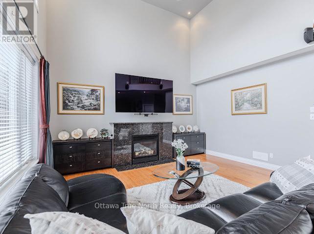 507 Kochar Drive, Ottawa, ON - Indoor Photo Showing Living Room With Fireplace