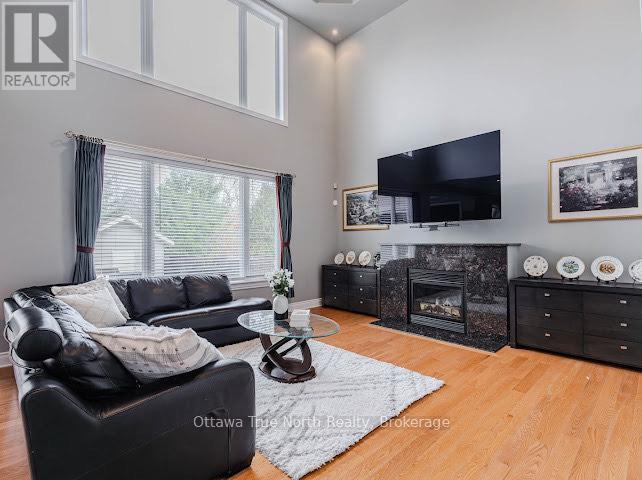 507 Kochar Drive, Ottawa, ON - Indoor Photo Showing Living Room With Fireplace
