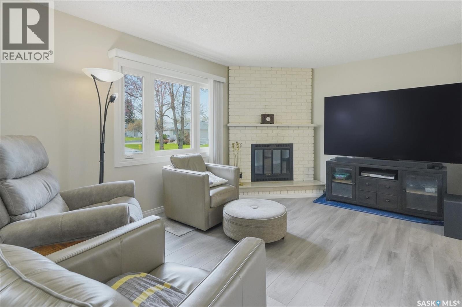 2922 21St Street W, Saskatoon, SK - Indoor Photo Showing Living Room With Fireplace