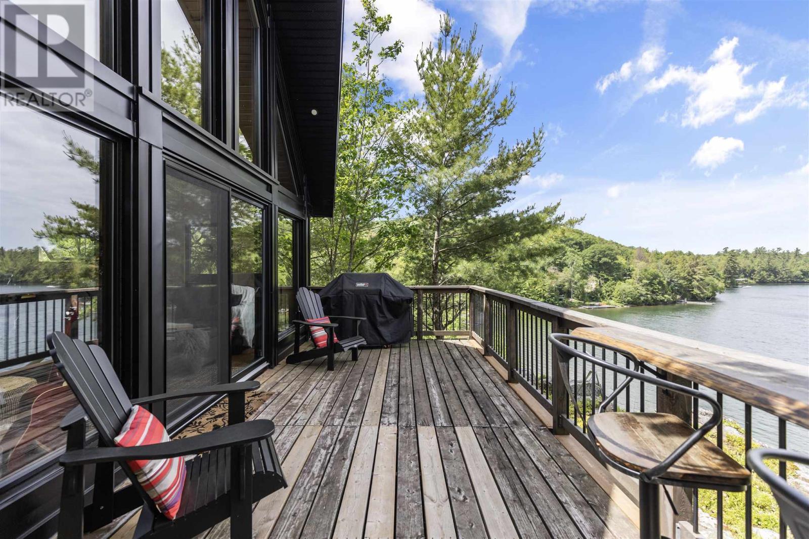 188 Cottage Rd, Echo Bay, ON - Outdoor With Body Of Water With Deck Patio Veranda With Exterior