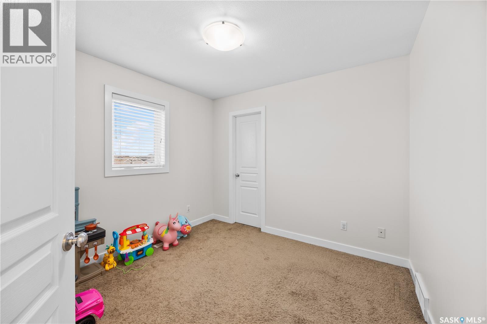 806 Stonebridge Common, Saskatoon, SK - Indoor Photo Showing Other Room
