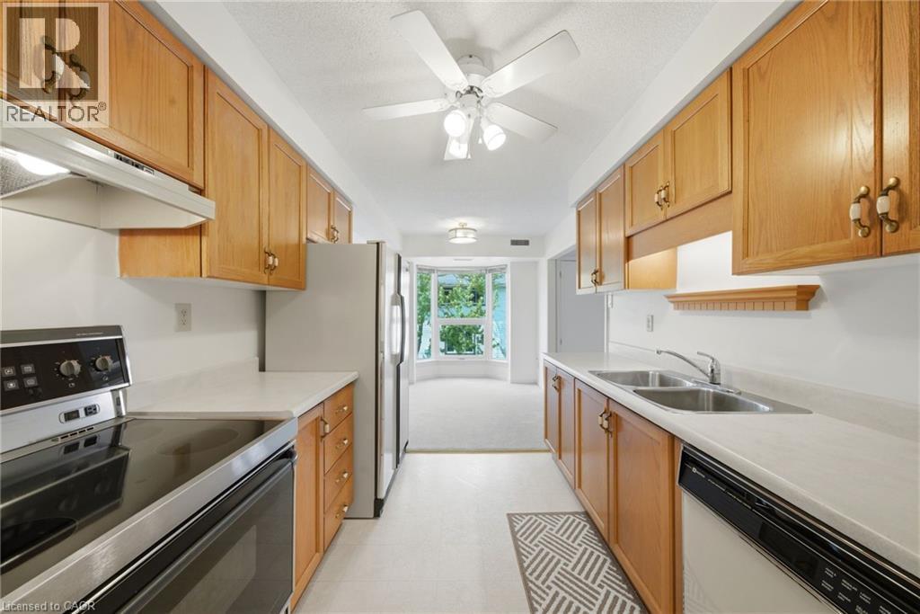 416 Limeridge Road E Unit# 303, Hamilton, ON - Indoor Photo Showing Kitchen With Double Sink
