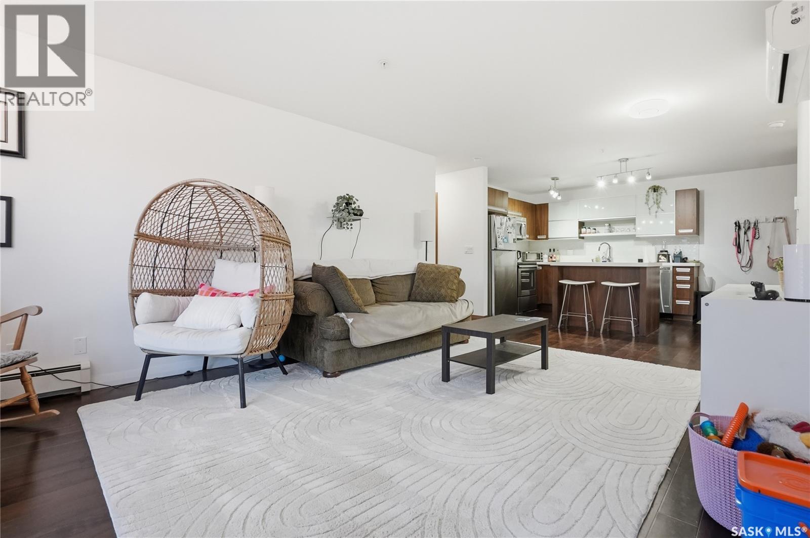 107 130 Phelps Way, Saskatoon, SK - Indoor Photo Showing Living Room