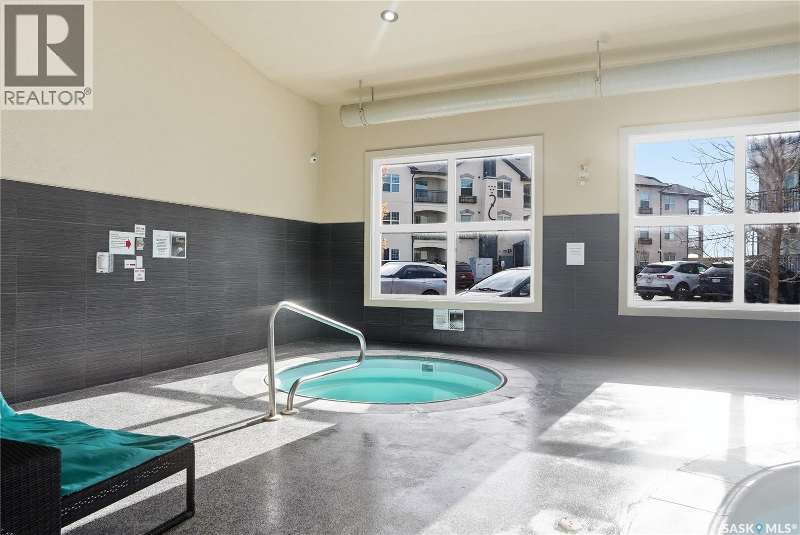 107 130 Phelps Way, Saskatoon, SK - Indoor Photo Showing Other Room With In Ground Pool
