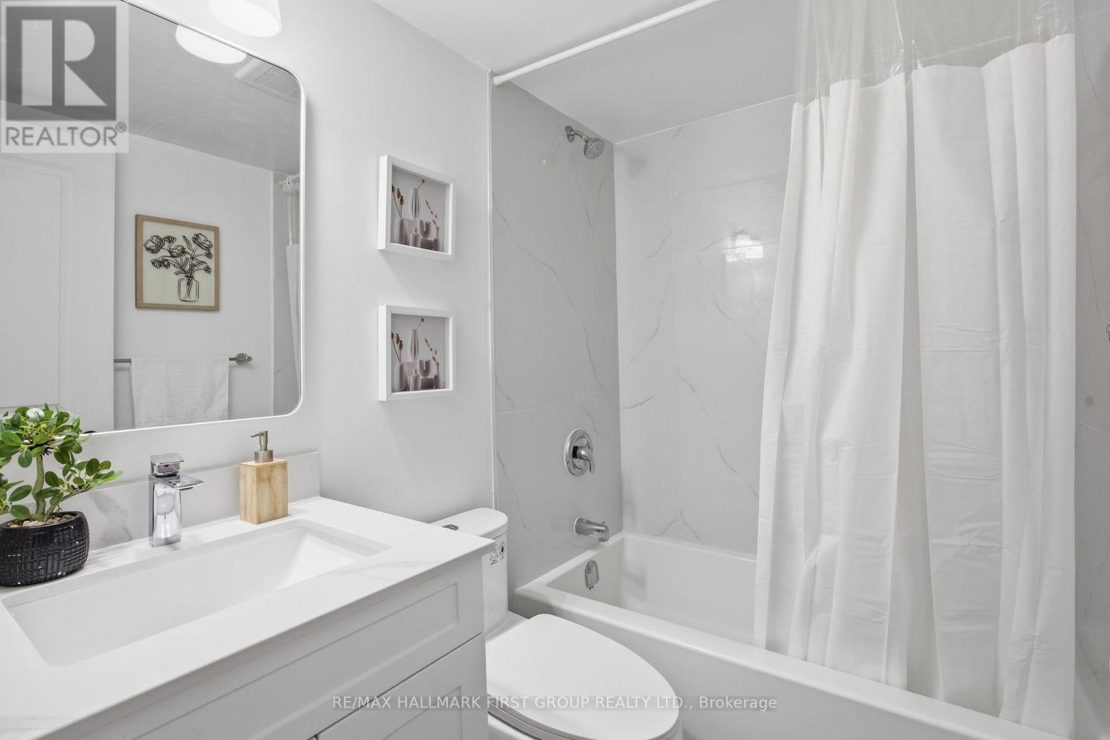 101 - 1950 Kennedy Road, Toronto, ON - Indoor Photo Showing Bathroom