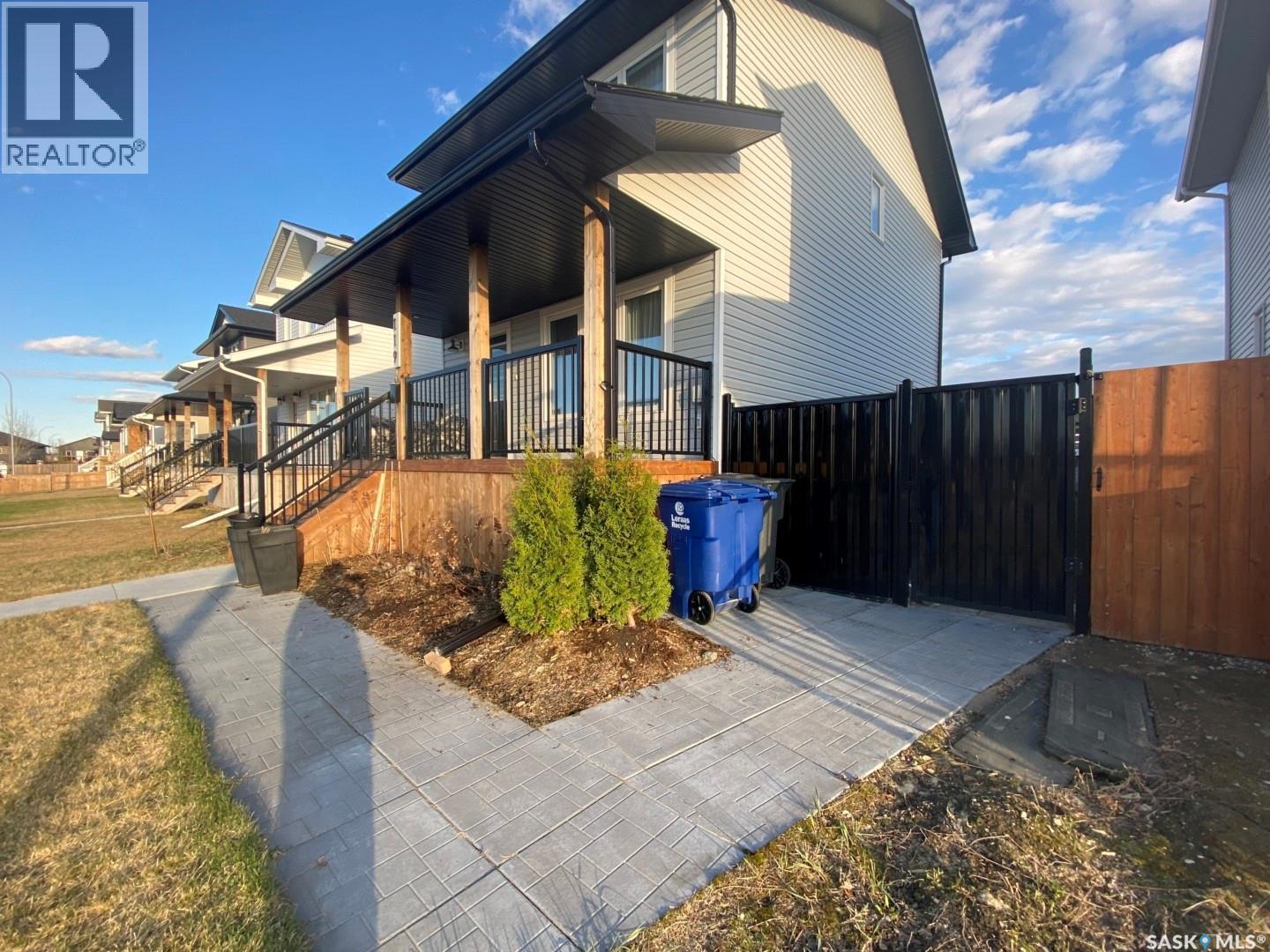 119 Reddekopp Crescent, Warman, SK - Outdoor With Deck Patio Veranda With Exterior