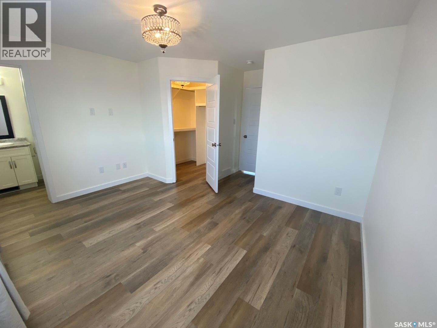 119 Reddekopp Crescent, Warman, SK - Indoor Photo Showing Other Room