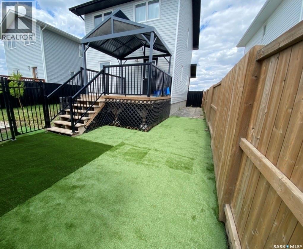119 Reddekopp Crescent, Warman, SK - Outdoor With Deck Patio Veranda