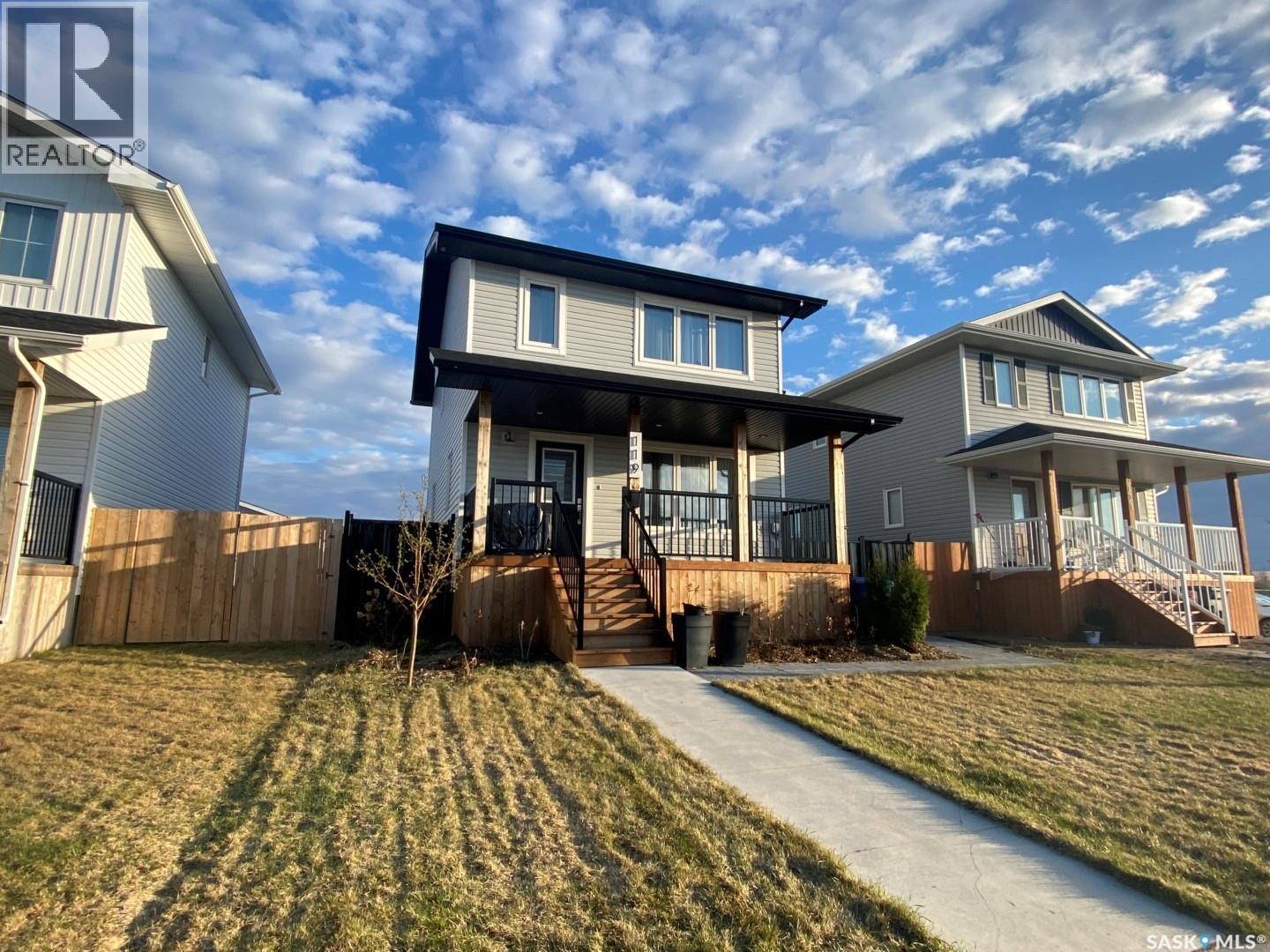 119 Reddekopp Crescent, Warman, SK - Outdoor With Deck Patio Veranda With Facade