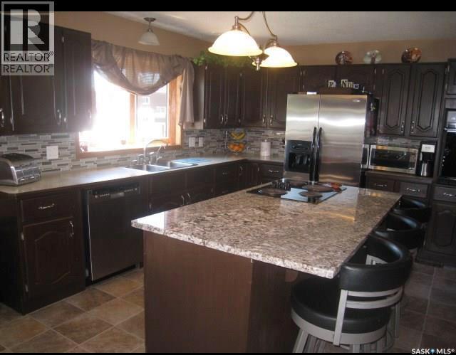1101 109Th Avenue, Tisdale, SK - Indoor Photo Showing Kitchen With Double Sink