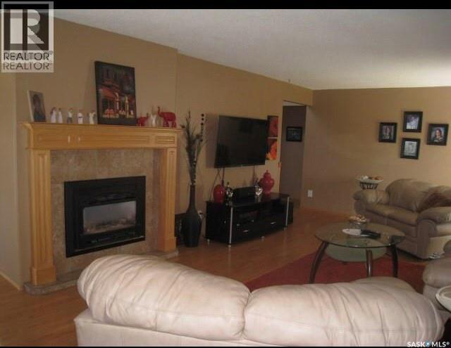 1101 109Th Avenue, Tisdale, SK - Indoor Photo Showing Living Room With Fireplace