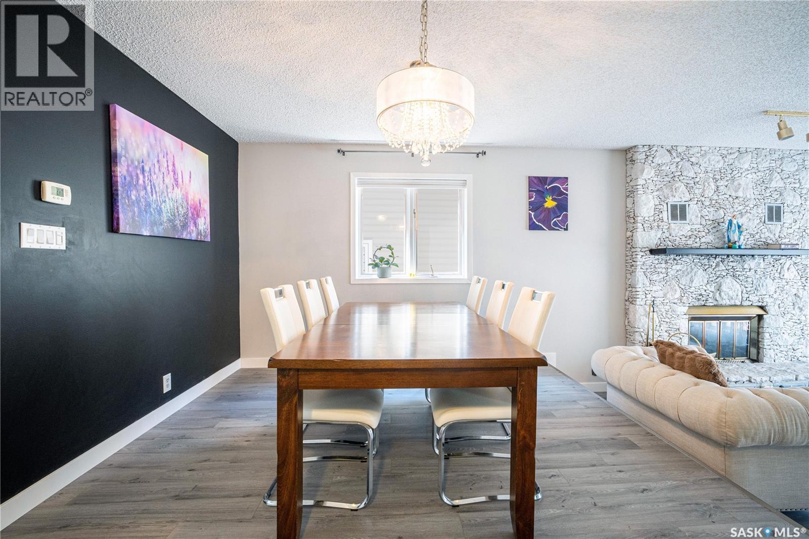 435 Christopher Road, Saskatoon, SK - Indoor Photo Showing Dining Room With Fireplace