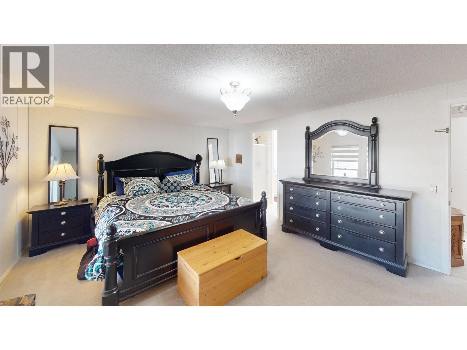 1302 Mountain Ash Road, Quesnel, BC - Indoor Photo Showing Bedroom