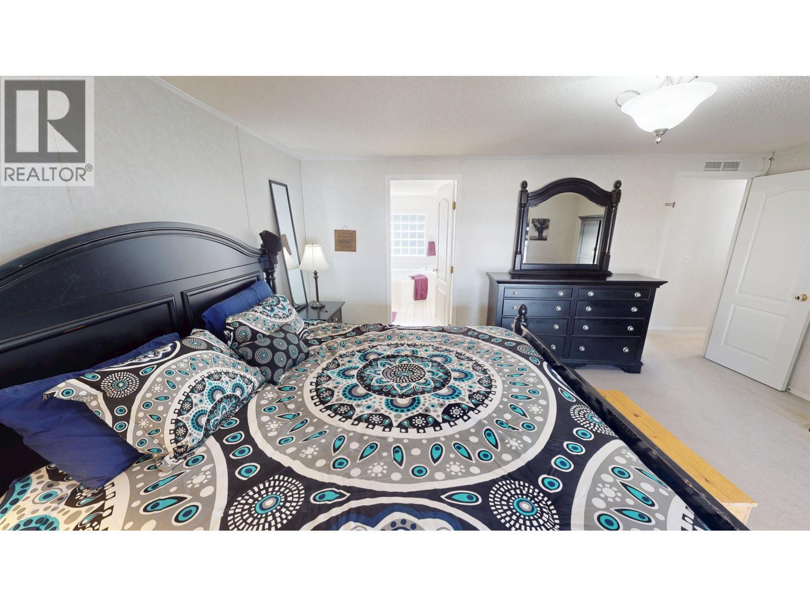 1302 Mountain Ash Road, Quesnel, BC - Indoor Photo Showing Bedroom