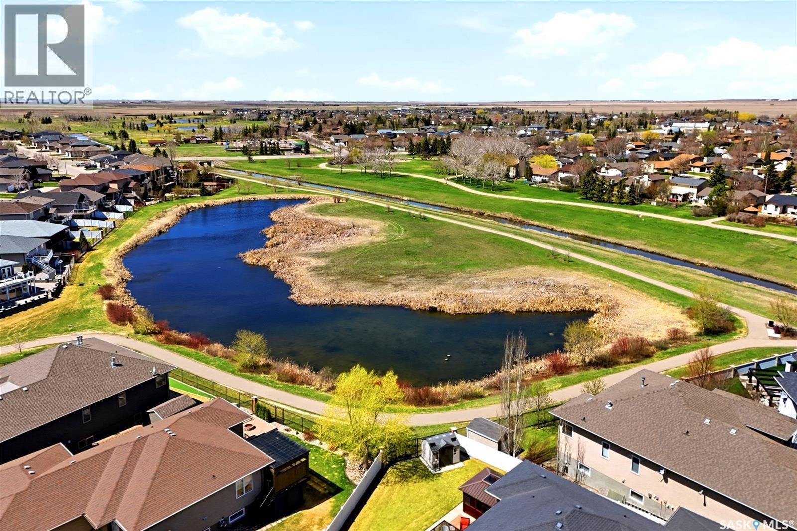 141 Oxbow Crescent, Regina, SK - Outdoor With Body Of Water With View