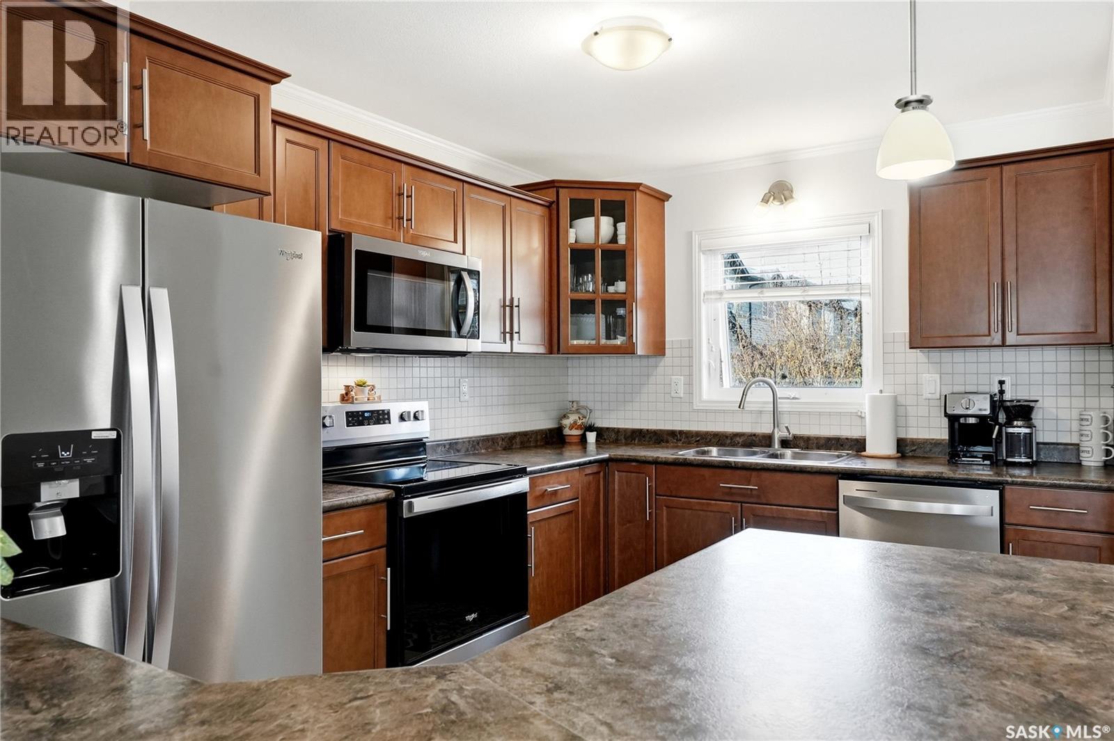 610 110 Shillington Crescent, Saskatoon, SK - Indoor Photo Showing Kitchen With Stainless Steel Kitchen With Double Sink
