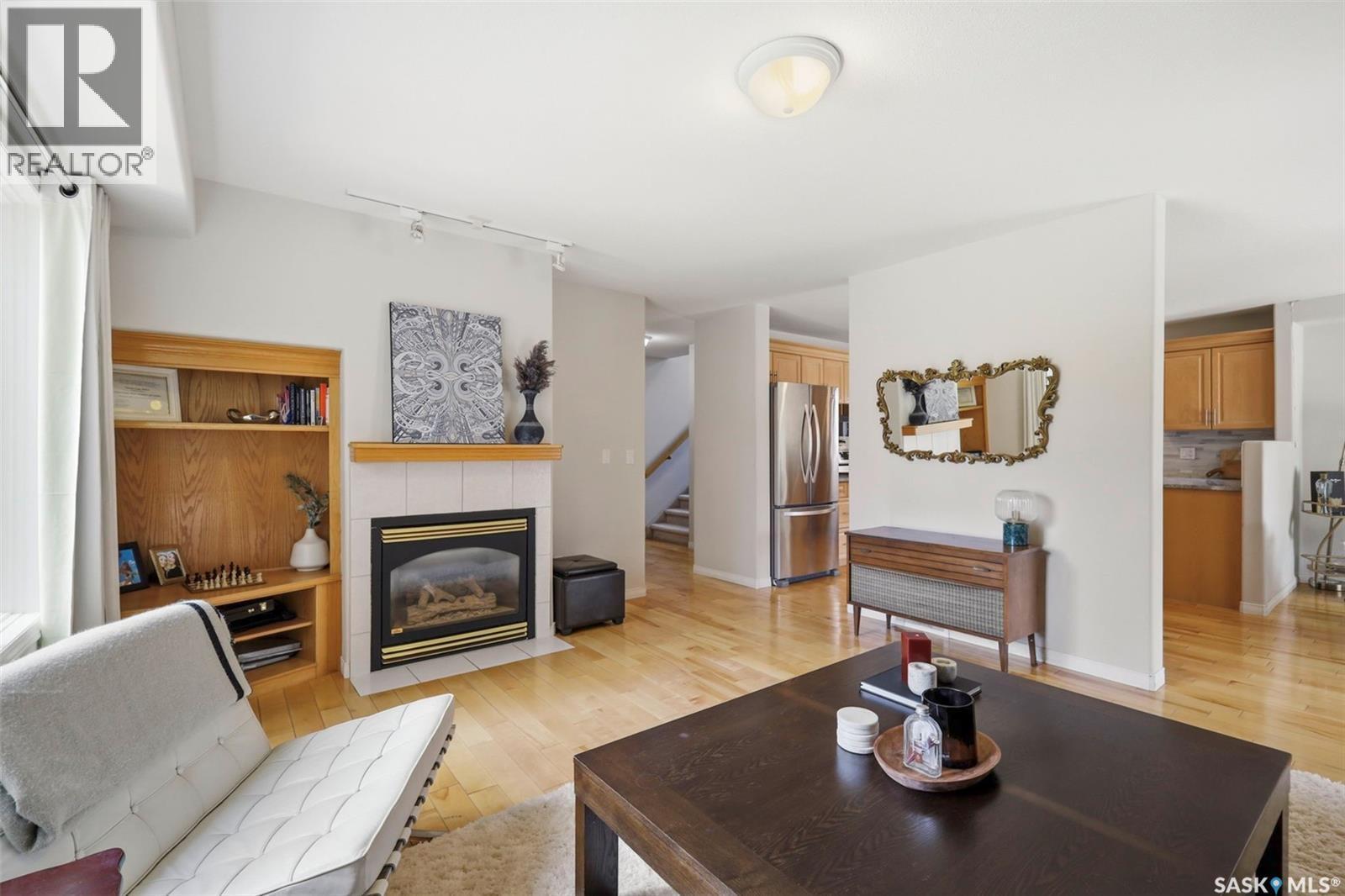 901 9Th Street E, Saskatoon, SK - Indoor Photo Showing Living Room With Fireplace