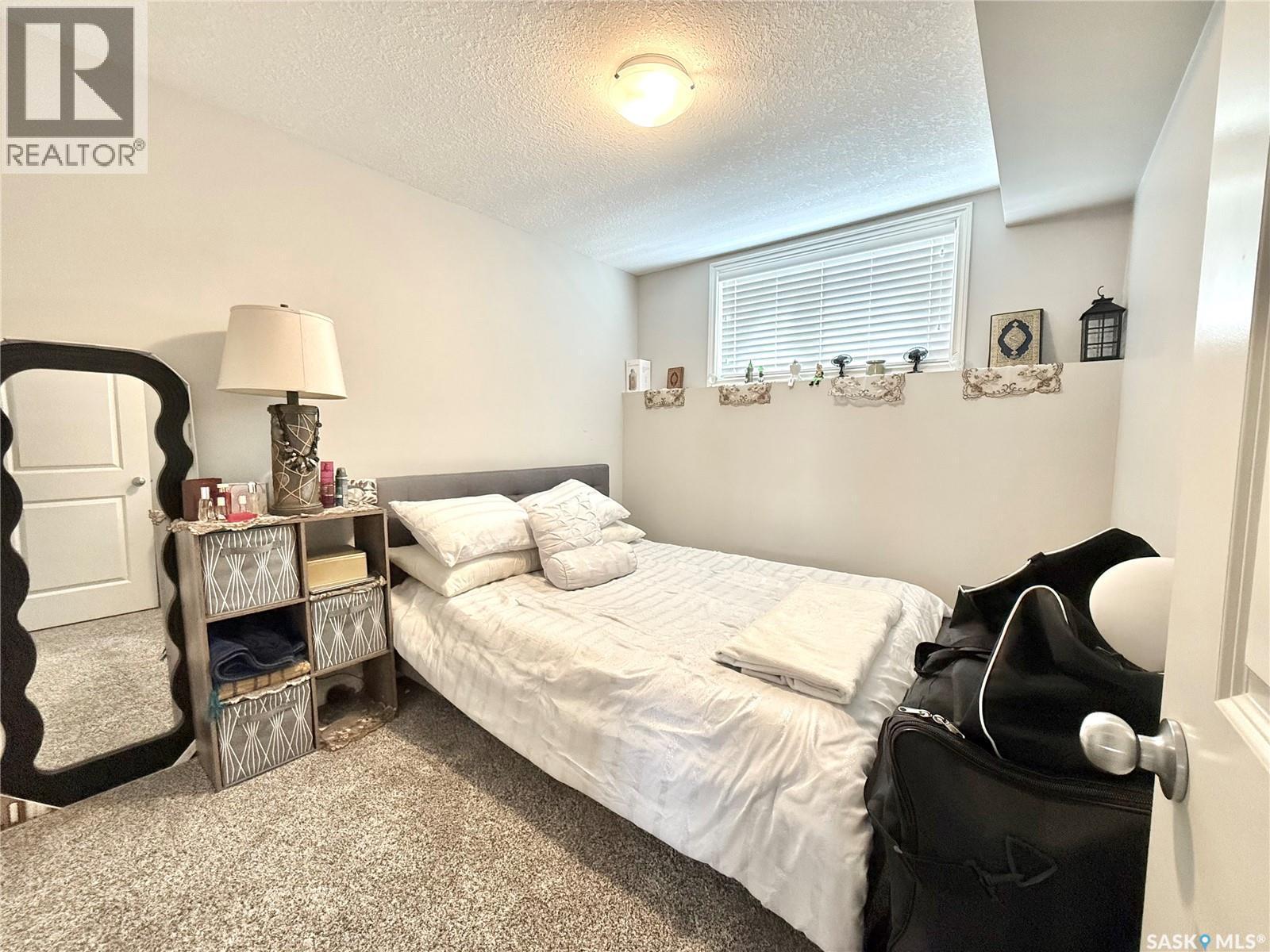 503 110 Akhtar Bend, Saskatoon, SK - Indoor Photo Showing Bedroom