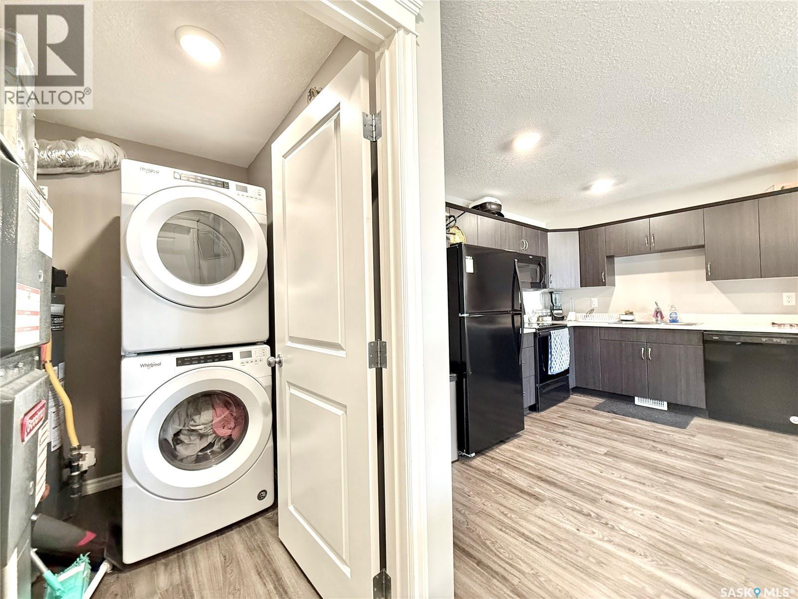 503 110 Akhtar Bend, Saskatoon, SK - Indoor Photo Showing Laundry Room