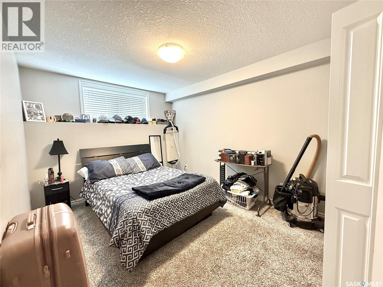503 110 Akhtar Bend, Saskatoon, SK - Indoor Photo Showing Bedroom