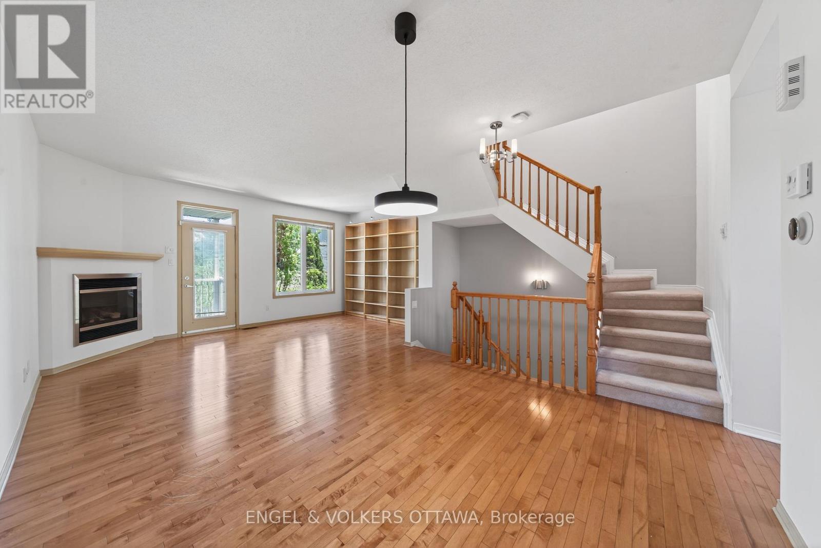 27 Briarway Private, Ottawa, ON - Indoor With Fireplace
