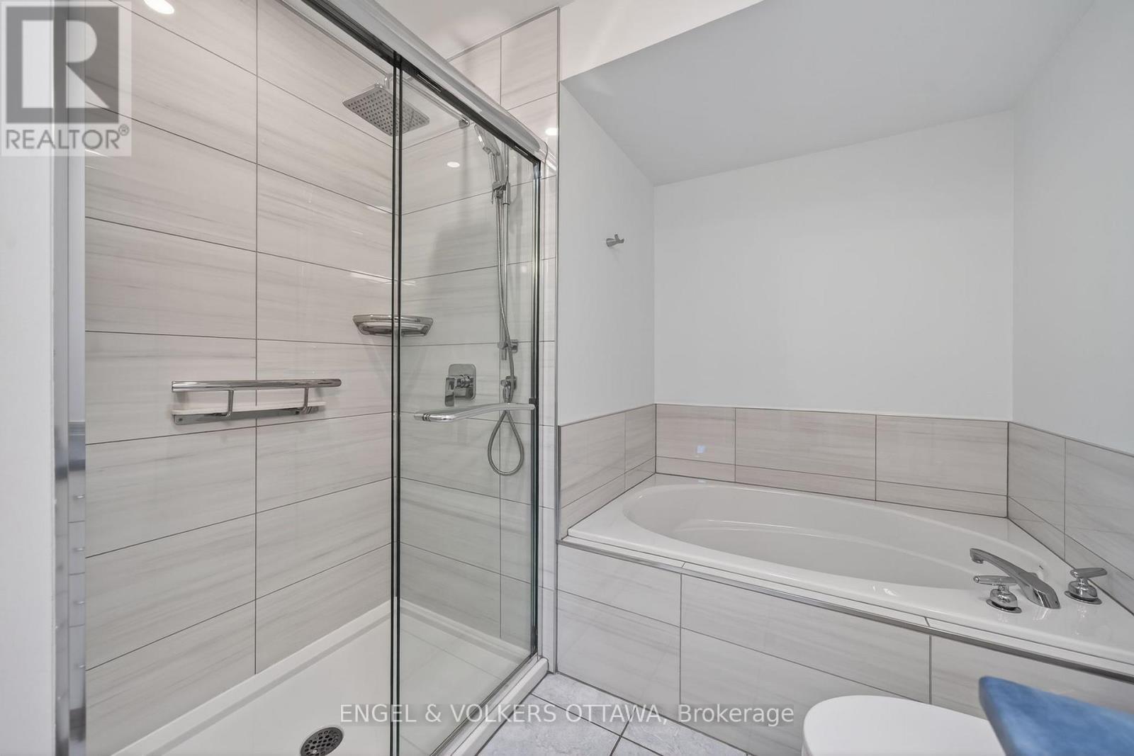 New walk in shower and Toto toilet in 2021 - 27 Briarway Private, Ottawa, ON - Indoor Photo Showing Bathroom