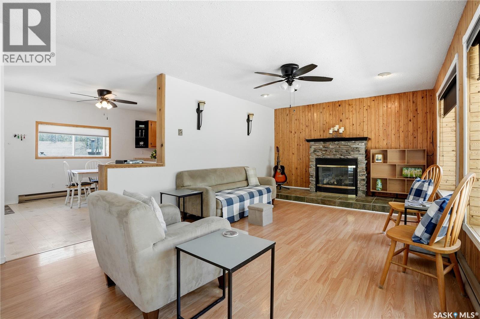 123 Burberry Road, Christopher Lake, SK - Indoor Photo Showing Living Room With Fireplace