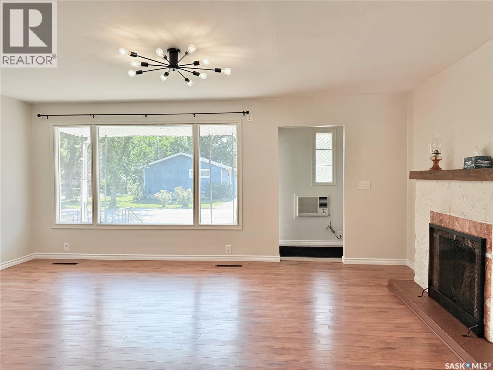 201 Ottawa Street, Davidson, SK - Indoor Photo Showing Other Room With Fireplace