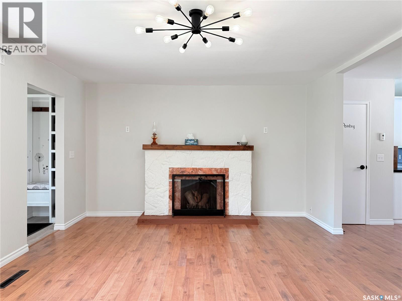 201 Ottawa Street, Davidson, SK - Indoor Photo Showing Living Room With Fireplace