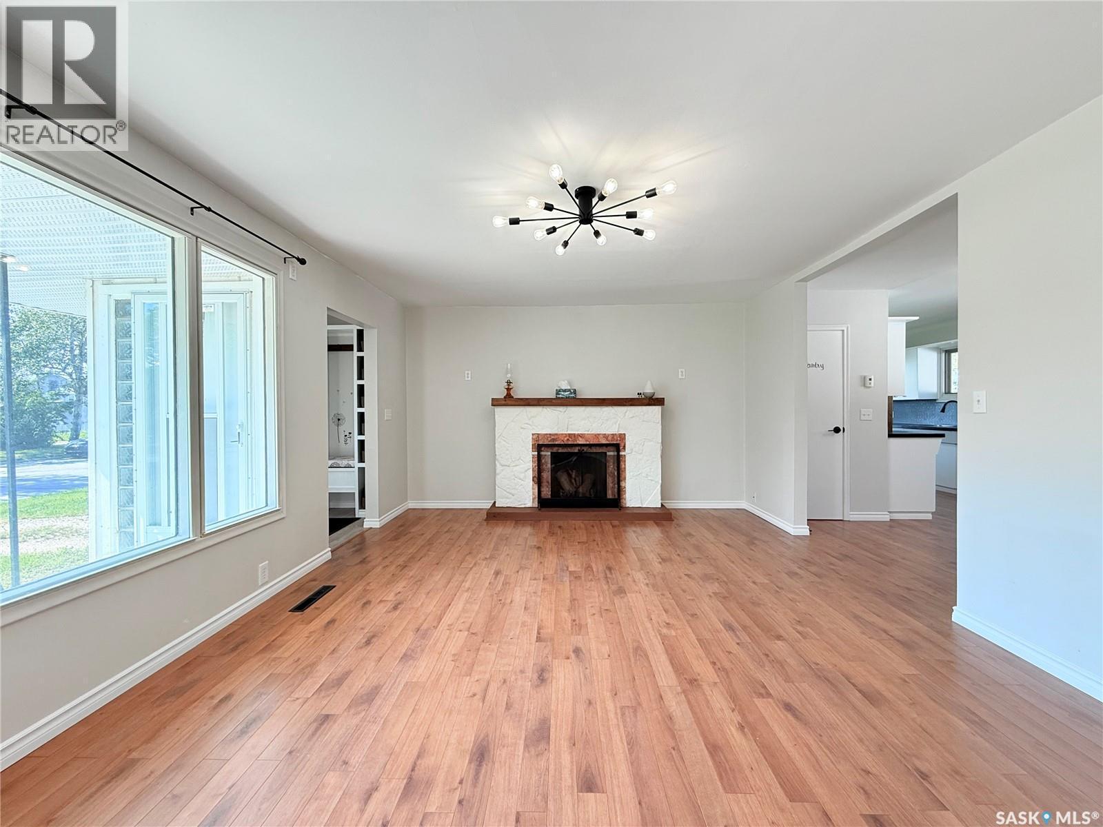 201 Ottawa Street, Davidson, SK - Indoor Photo Showing Living Room With Fireplace