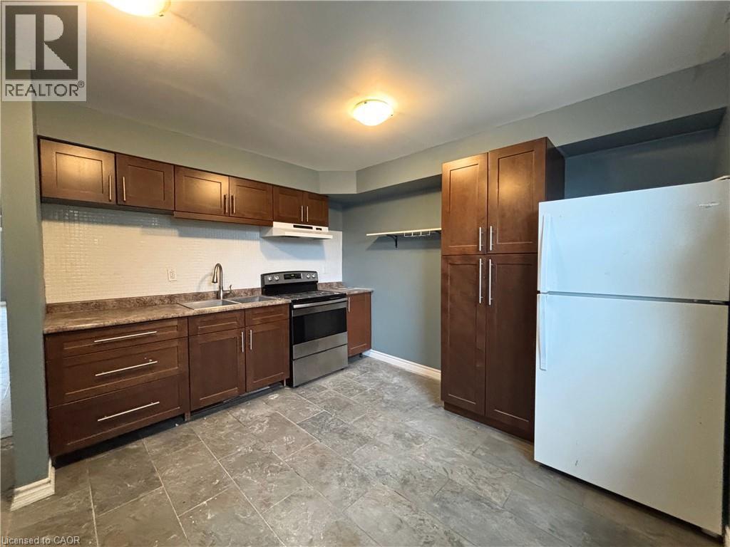 518 Cannon Street E, Hamilton, ON - Indoor Photo Showing Kitchen With Double Sink