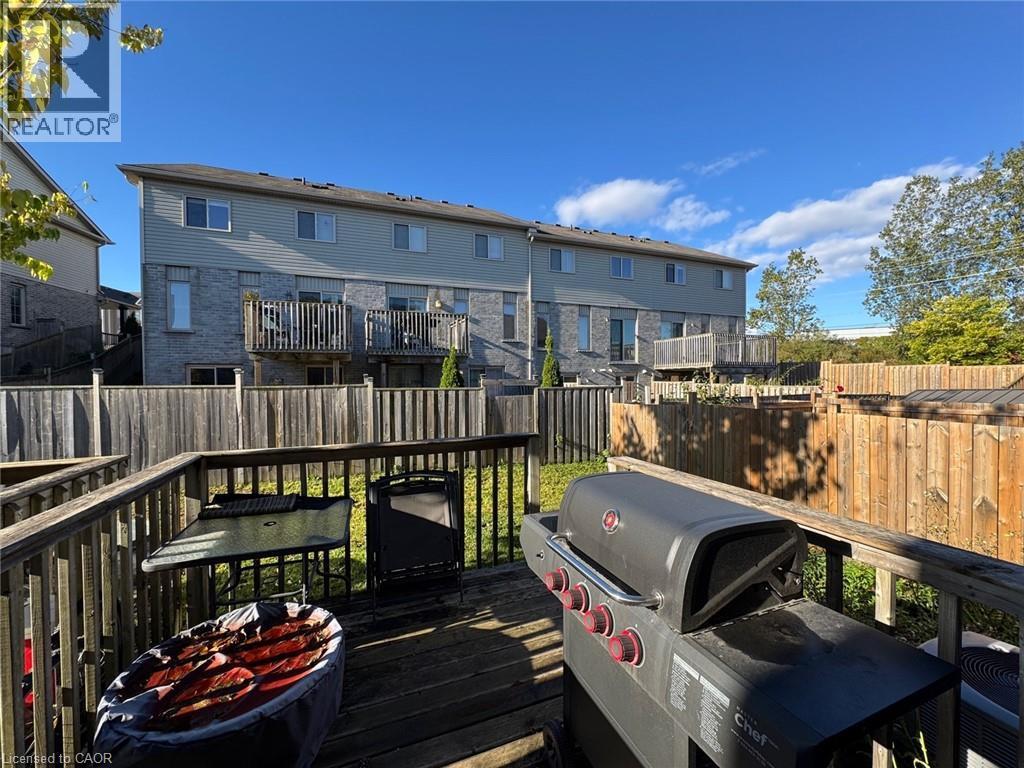 Elevated wooden deck with perimeter railing - 517 Northbrook Place, Kitchener, ON - Outdoor With Deck Patio Veranda With Exterior