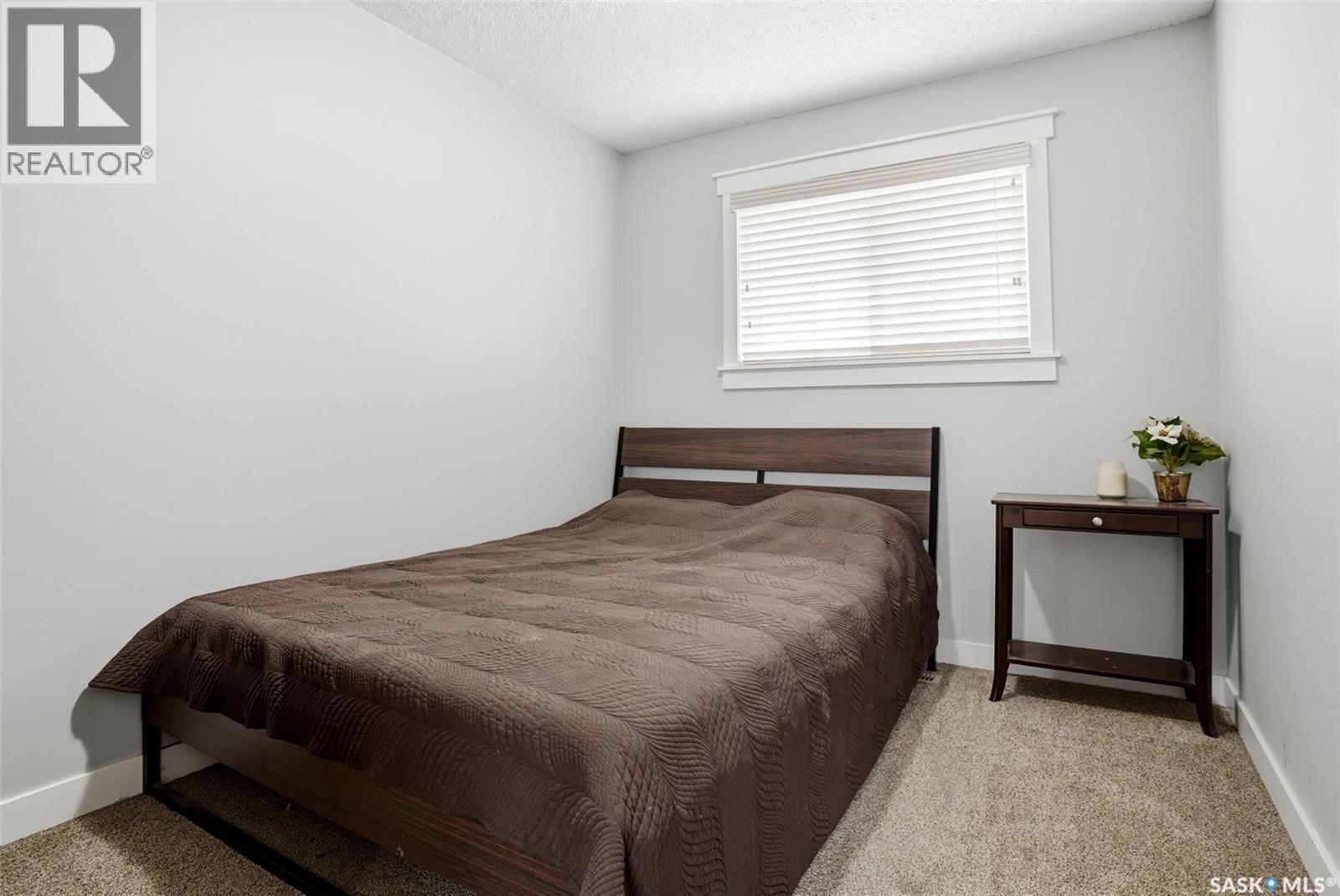 14 Diamond Street, Regina, SK - Indoor Photo Showing Bedroom