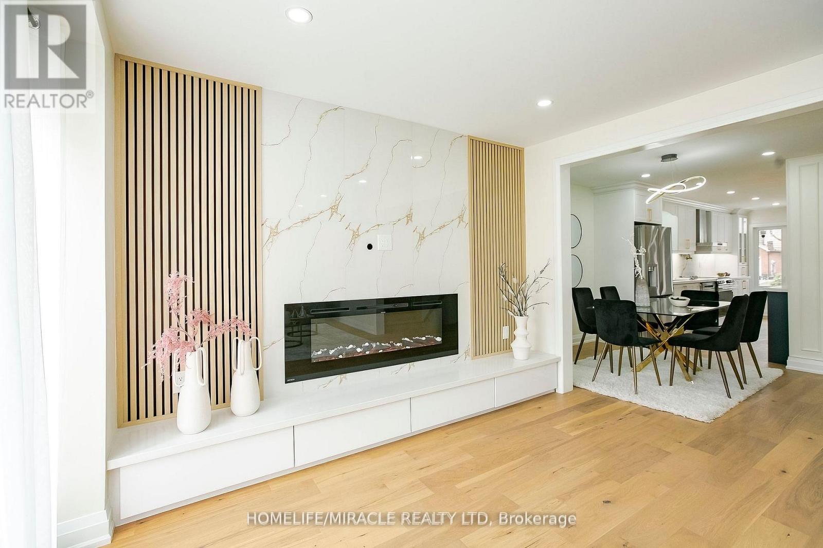 52 Foxacre Row, Brampton, ON - Indoor Photo Showing Living Room With Fireplace