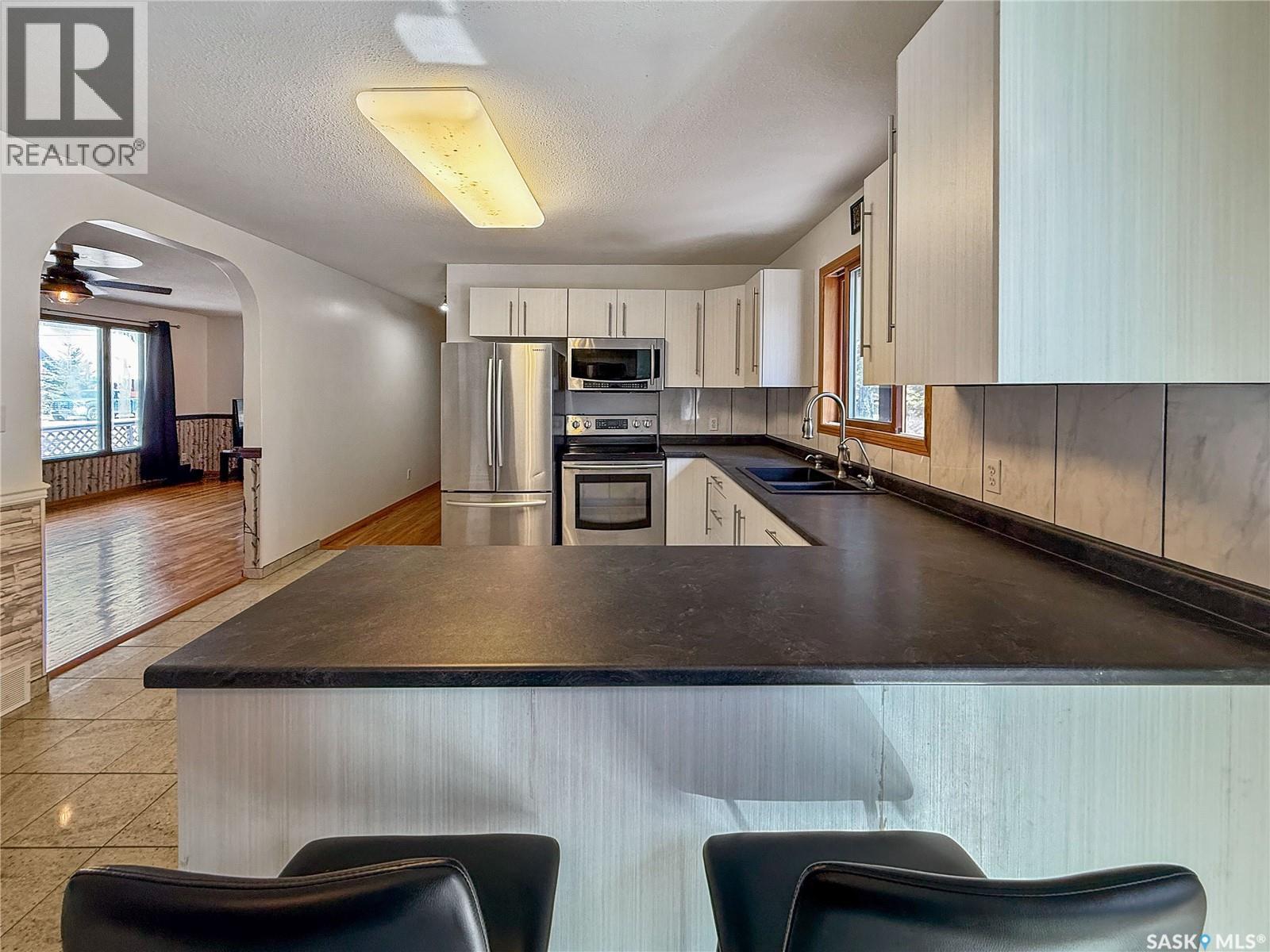 12 5Th Avenue, Candle Lake, SK - Indoor Photo Showing Kitchen With Double Sink