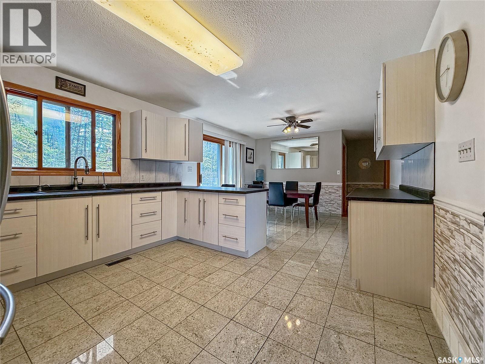 12 5Th Avenue, Candle Lake, SK - Indoor Photo Showing Kitchen With Double Sink