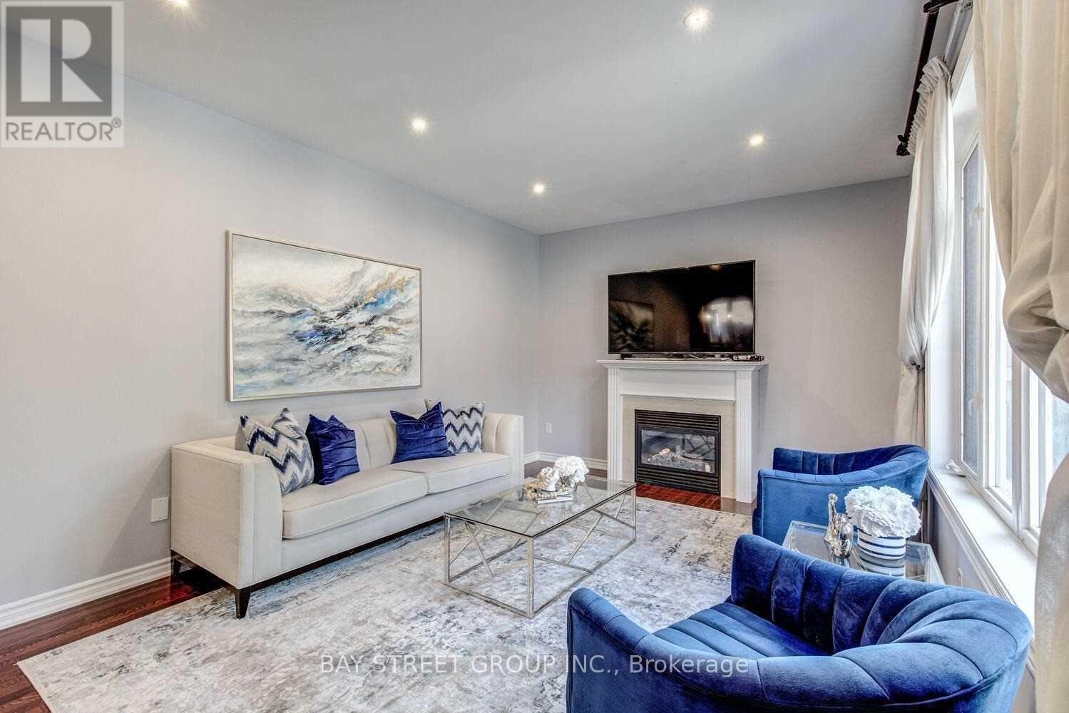 Upper - 134 Ascalon Drive, Vaughan, ON - Indoor Photo Showing Living Room With Fireplace