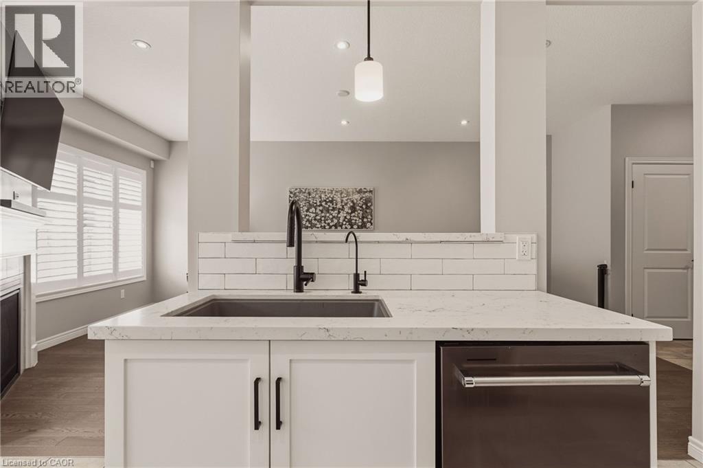 All light fixtures included in sale. - 81 Beasley Grove, Ancaster, ON - Indoor Photo Showing Kitchen