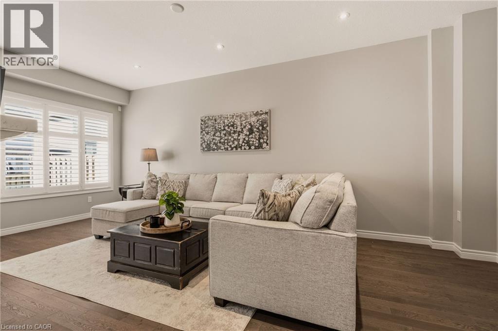Lots of natural light. - 81 Beasley Grove, Ancaster, ON - Indoor Photo Showing Living Room