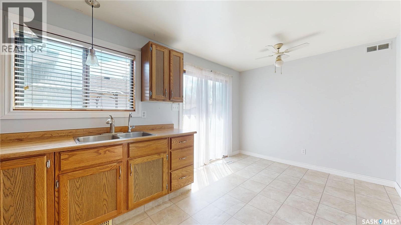 1134 Brown Street, Regina, SK - Indoor Photo Showing Kitchen With Double Sink